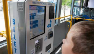 Mobile ticket machine BM-102 selling in a public transport vehicle in Cracow.